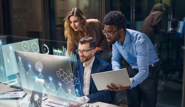 Team,Analyzing,Data,Using,Innovative,Technology,With,Futuristic,Digital,Interfaces